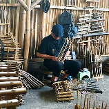 Local craftsmen working together at Saung Angklung Udjo
